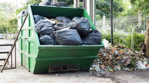 Bulk waste collection truck removing furniture from a Tufnell Park residence